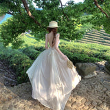 Beautiful Lace Splicing Big Bare Back Sling Dress Strapped Bow Fairy Gas Big Swing Dress Travel To Wear Long Skirt
