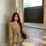 Qaqi-Colored Windwear Coat Women Autumn 2025 New Long Sleeves To Close The Waist Double Buckle Long Outer Coat