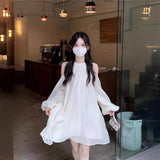 French Orange Tea Sheheben Dress Women's New 2026 Sweet Design Shoulder Temperament Hanging Neck Dress