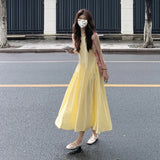 French Light Yellow Sleeveless Vest Sling Dress Female Schandeed Dambamine Bright Xinjiang Seaside Vacation Long Dress