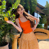 Yunnan Sanya Seaside Holiday Set Dopamine Orange Hanging Sling High Waist Crumb Skirt Two Sets