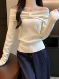 One-Word Collar Bow Design Long-Sleeved Knitted Shirt Women Autumn 2025 New Pure Hot Girl Bare Shoulder