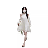 French Orange Tea Sheheben Dress Women's New 2026 Sweet Design Shoulder Temperament Hanging Neck Dress