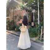 2026 Summer French Sweet And Gentle Super Fairy Temperament Hanging Neck Dress Female White Moonlight Seaside Holiday Dress