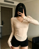 V-Necked Bottom-Up Women 2026 Autumn New Pure Tea Art White Irregular Long-Sleeved T-Shirt Short Shirt