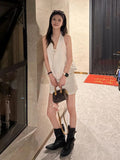 Korean Design Feels White Vneck Hanging Neck Sleeveless Top Woman 2026 New Summer Set Hip Skirt